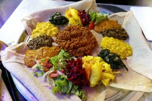 Mesob for 2 people (Vegan plate) at Little Ethiopia in Geneva