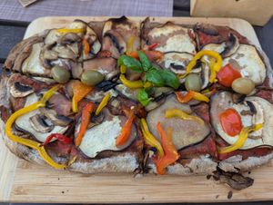 Black vegan pizza at Caffe Galeria in Piran