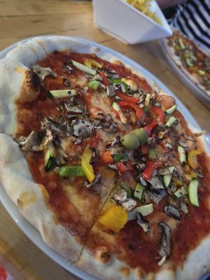 Stone baked Vegan Pizza minus vegan cheese at Pizzeria Desetka in Cavtat