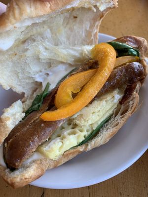 Breakfast sandwich contain half a JustEgg, mayo and some veg  at The Allenby Coffee Bar in Victoria