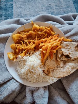 Aloo tama with garlic rice, Himalayan chips and tandoori roti. Not the full portion sizes, just as much as I could fit on my plate at Gurkha in Dawlish