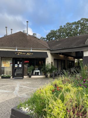 Front of the restaurant faces the parking lot. Outdoor dining under the roof   at Thai Kuu Restaurant in Philadelphia