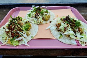 Sweet potato and pumpkin seed tacos with vegan cheese and hot sauce. at Branch on Bowen in Bowen Island