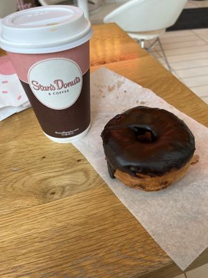 Oat milk latte and chocolate donut   at Stan's Donuts & Coffee - Erie St in Chicago