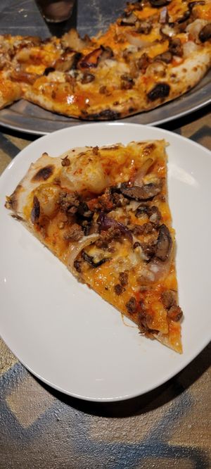 Sausage Onion Mushroom Pizza at The Oasis Santa Rosa Beach in Santa Rosa Beach