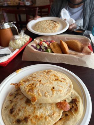 Pork and carne asada with cheese pupusas  at Pupusatown in Torrance