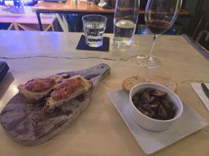 White bean bruschetta no cheese and setas jerez no butter at Vino Loco Wine and Tapas Bar in Englewood