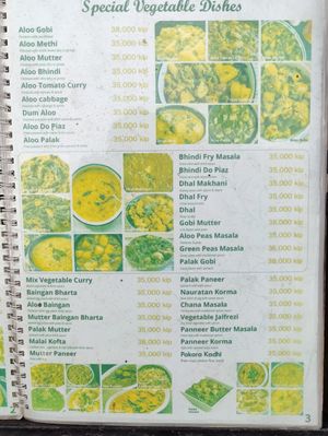 Vegetarian dishes. Ask for dairy and ghee to be omitted at Nazim in Vientiane