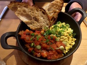 Shakshuka: side tomato and bean stew with scrambled tofu at Source in York