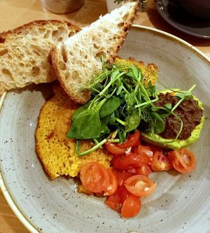 Chickpea omlette with sourdough toast, avocado, black olive tapaende & salsa at Source in York