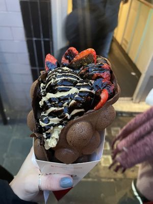 chocolate base with chocolate sauce, strawberries and pistachio ice cream   at Bubblewrap Waffle in London