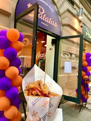 Fancy balloons for the grand opening! My first taste of the addiction! at Patatas in Belgrade