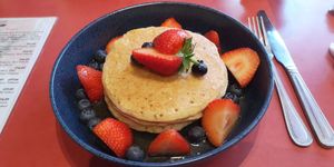 Pancakes with maple syrup and fruit at Emma's Diner in Whitby