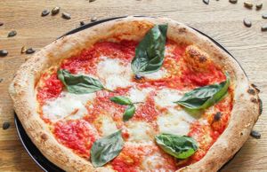 Pizza with vegan cheese at Bemma Bar in Wroclaw