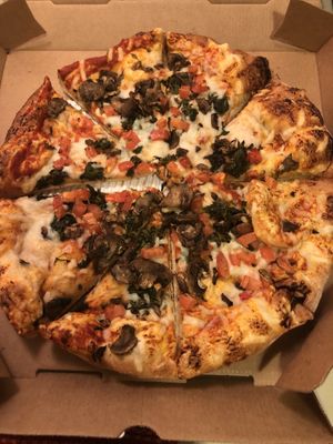 Build your own: dairy free cheese, tomatoes, mushrooms, spinach   at Toppers Pizza in Bloomington