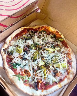 Custom pizza with vegan cheese and vegan sausage   at Mod Pizza in Dallas