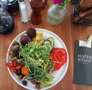 "Tel Aviv Beach": Homemade Falafel, homemade Hummus, Avocado, Tomato, Cucumber, Olive, Caper, Rucola with Couscous, Bread at Hafenstadt Urban Area in Klagenfurt