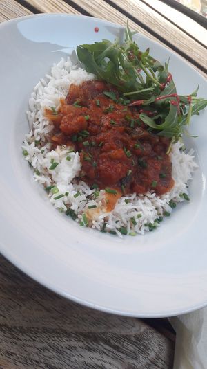 spicy aubergine pot with rice (vegan) at Aha Cafe in Dresden