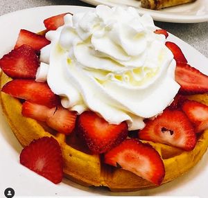 Strawberries and Cream Waffle at Donut Villa Diner in Cambridge
