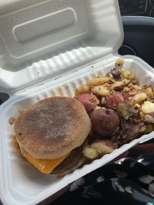 breakfast sandwich and house potatoes   at Donut Villa Diner in Cambridge