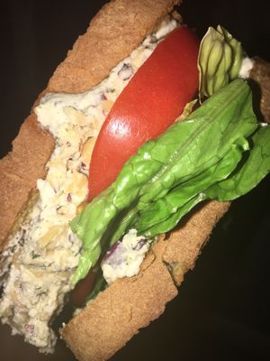 Alkaline chickpea tuna on spelt with hemp mayo, romaine and Roma tomatoes. at The Alkaline Electric Goddess in Indianapolis