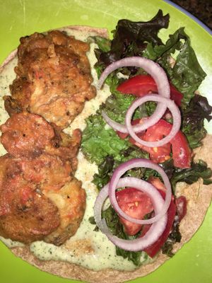 Buffalo oyster mushroom chickn wrap on spelt with hemp mayo, onions, roma tomatoes and romaine on spelt tortilla. at The Alkaline Electric Goddess in Indianapolis