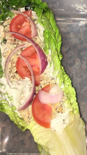 Naked chickpea tuna with hemp mayo, roma tomatoes on a romaine heart. at The Alkaline Electric Goddess in Indianapolis
