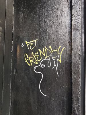 Pet friendly sign at L'Arquera Cafeteria in Mataro