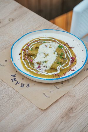 Vegan Swiss Enchiladas
Omelette stuffed with oatmeal chorizo, au gratin with delicious vegan mozzarella cheese and cream
 at Prana Café in Cancun