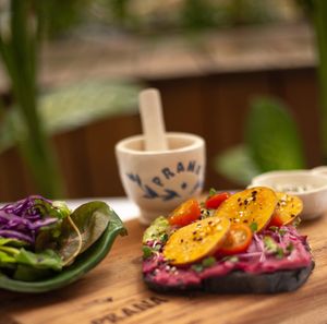 Vegan Toast with Beet Hummus
Avocado, golden beets, radish sprouts, cherry tomato, fresh vegan cheese
 at Prana Café in Cancun