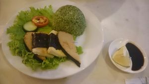 Fish with flavored green rice at Ahs-Wes in Baguio City