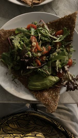 Galette salad - Spinach, vegan cheese, avocado, cherry tomatoes, spring onions, dressing & mixed leaf salad  at Flo's Crêperie in Noosa Heads