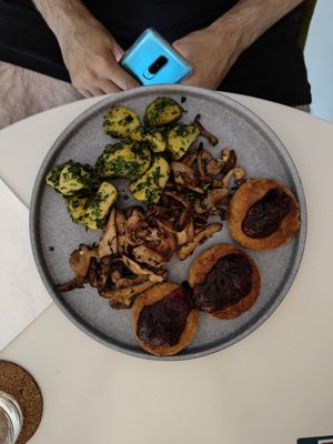 Chickpea patties with oyster mushrooms and baked potatoes at BUNT Bistro in Cluj-napoca