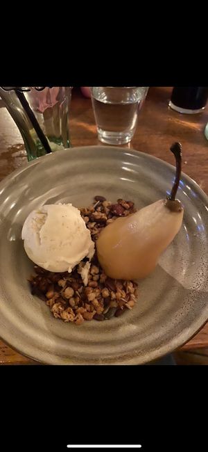 Prosecco pear with vegan vanilla ice cream and granola 💗 at The Peterville Inn in St Agnes