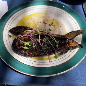 Demi aubergine mariné au midi et sésame, crème végétale ail et amande.   at Aux Pigeons Blancs in Saint-jean-de-luz