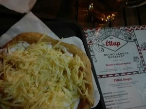 Vegan langos with sour cream and cheese at Retró Lángos Budapest in Budapest