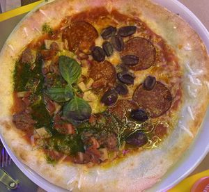 Half Peperoni / Half Carnivera  at Freedom Pizza in Madrid