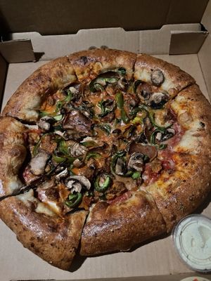 The Plug’s Lawyer Pizza (added  Stuffed Crust and Italian sausage)   at Meek's Vegan Pizza in Houston