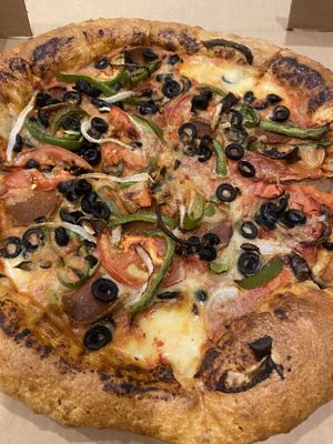 My green olives are missing. They owe me $1.50. Otherwise good    at Meek's Vegan Pizza in Houston