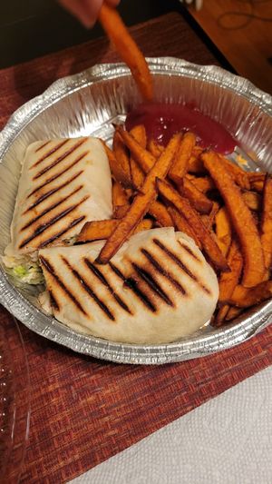chik'n caesar wrap with sweet potato fries at Vegan Eats and Treats Cafe in Glen Rock