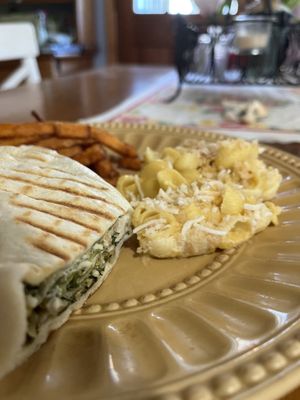 Vegan - chicken Caesar wrap with sweet potato fries along with mac n cheese. The portions are big too!     at Vegan Eats and Treats Cafe in Glen Rock