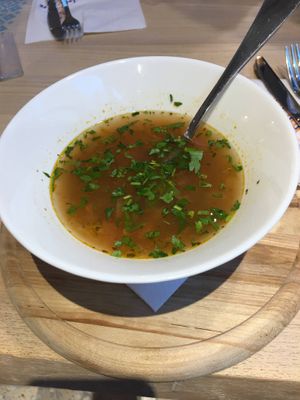 Vegetable sour soup at La plăcinte in Bucharest