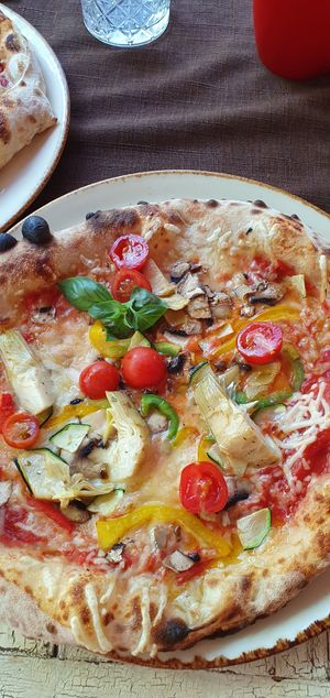 Vegan pizza with a lot of veggies and vegan cheese at Gostilnica Pizzeria Gust in Izola