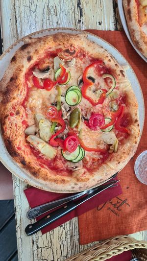 Vegetable pizza with vegan cheese at Gostilnica Pizzeria Gust in Izola