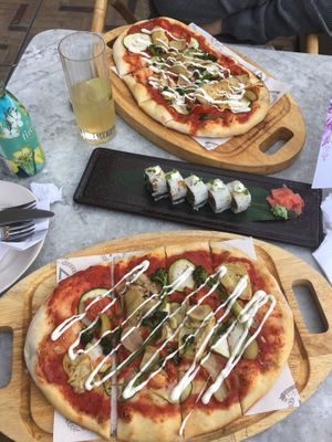 Charred broccolini and zucchini pizzette and charred asparagus sushi rolls  at Victors in Oxford