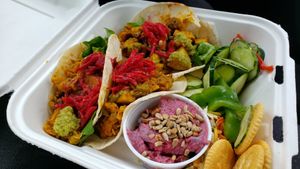 Ethiopian chik'n tacos ($16). Tasty, but didn't taste Ethiopian. Chicken was soy curls, tacos also had potato. at Mama Roots in Duluth