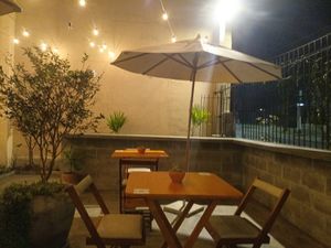 Outdoor seating area at Rango de Planta - Comida Vegana in Curitiba