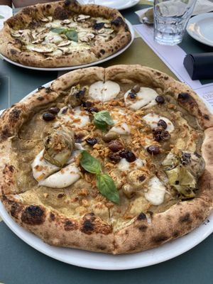 Eggplant pizza (non-veg pizza in the back)   at Organic Pizza & Food in Milan