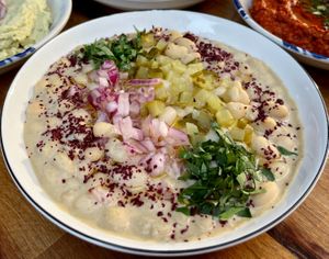"Antalya" Bean Salad 
Ovacık beans, antakya tahini, red onion, Taşköprü garlic, cumin and sumac (Vegan)  at Nevale Mutfak in Istanbul