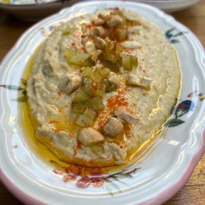 Humus
Chickpea, tahini, cumin, lemon, garlic, pickled cucumber, cashew peanut (Vegan)  at Nevale Mutfak in Istanbul